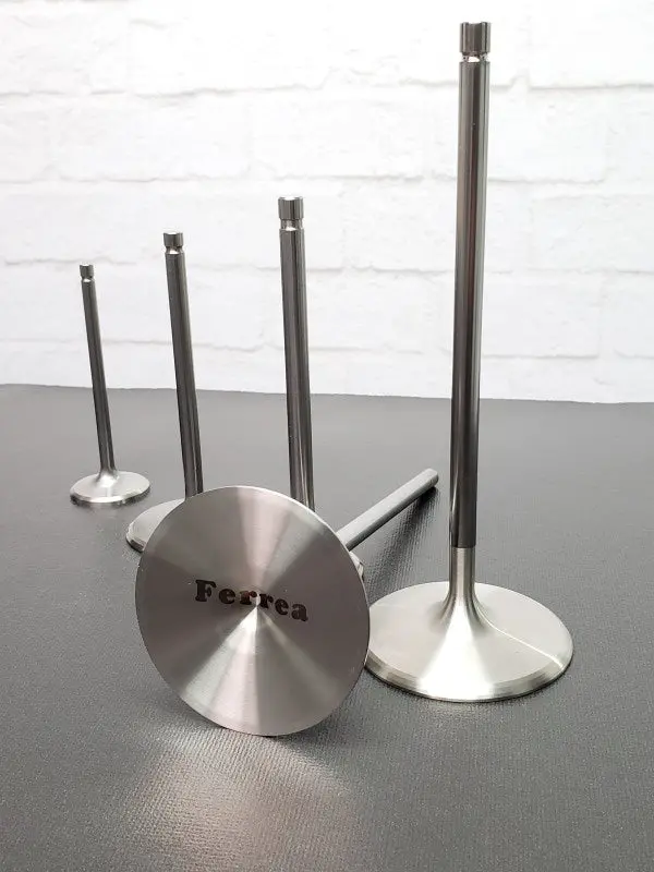 Ferrea Titanium Competition Intake Valves For Small-Block Chevy/Chrysler/Ford – 2.15″ Diameter, 11/32″ Stem, 5.55″ Length, 0.29″ Thickness, 12° Seat Angle, +.600″ Lift (8-Piece) 1